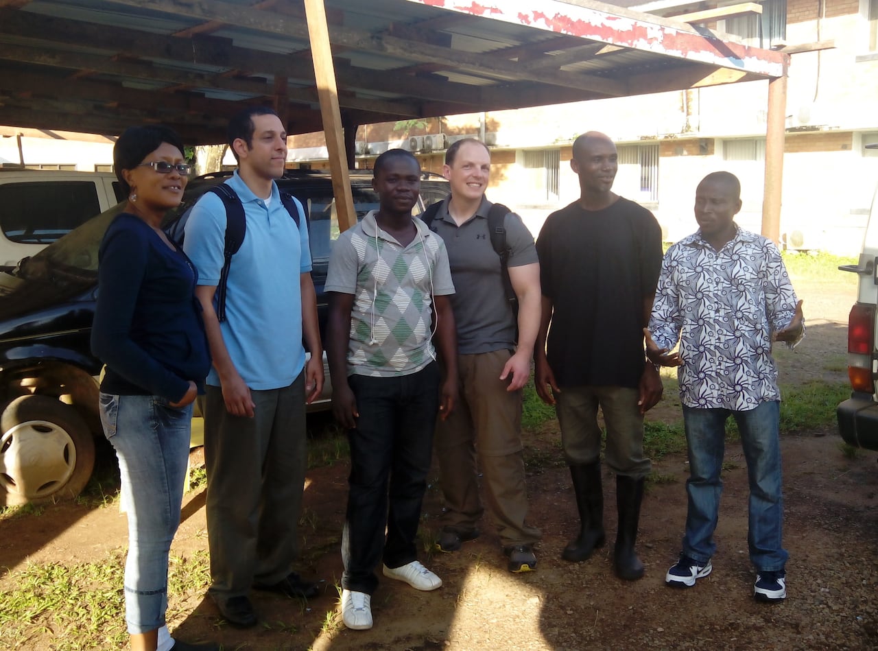 Canadian microbiologist Jason Kindrachuk (fourth from left) working in Liberia in Sept. 2014 during an unprecedented epidemic of Ebola in West Africa.