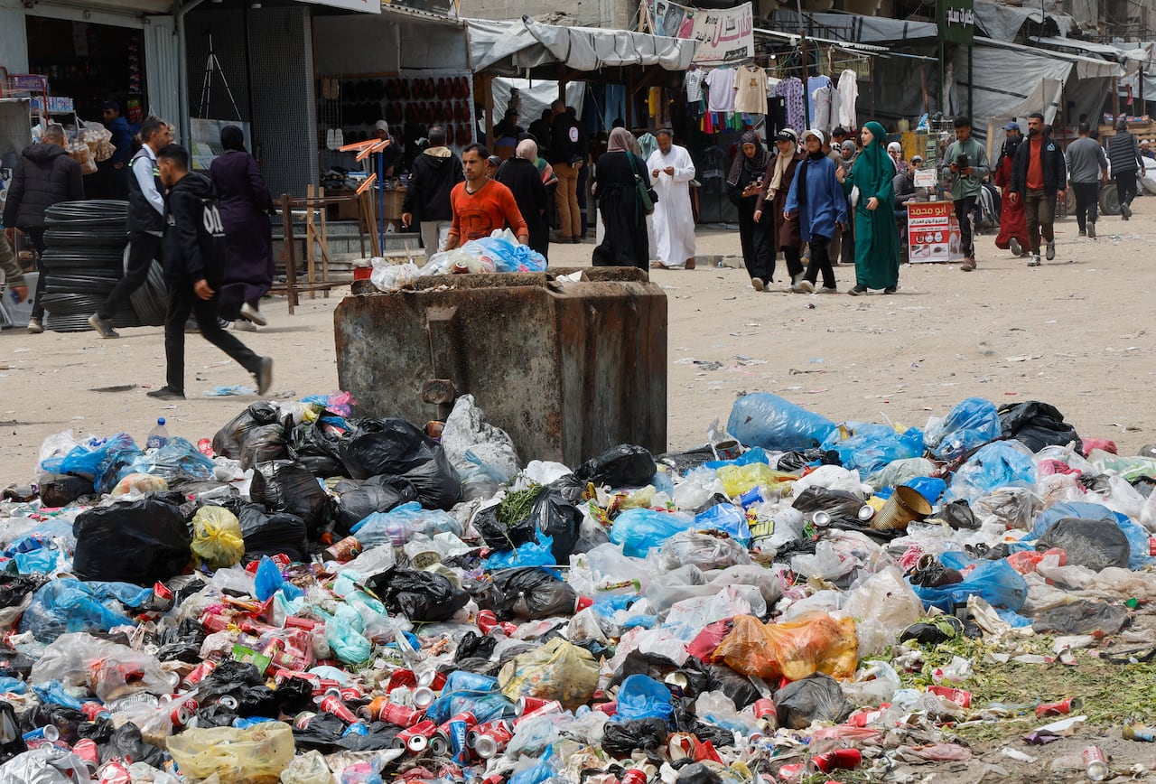 a pile of garbage in the middle of the street