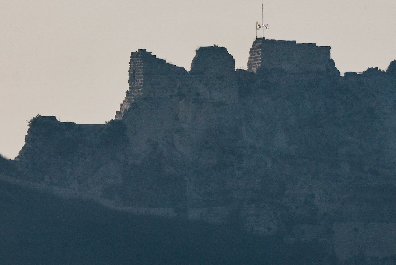 An Israeli flag and a Golani Brigade flag fly at the Beaufort Castle in southern Lebanon, as seen from Israel, May 31, 2026.