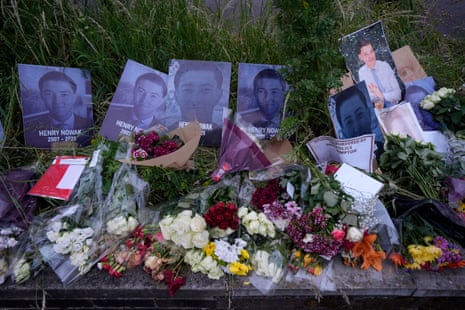 posters of a young boy next to flowers 
